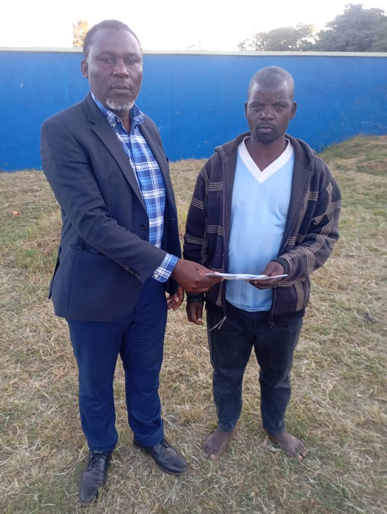 PJI Officer with Mr C Chipula
